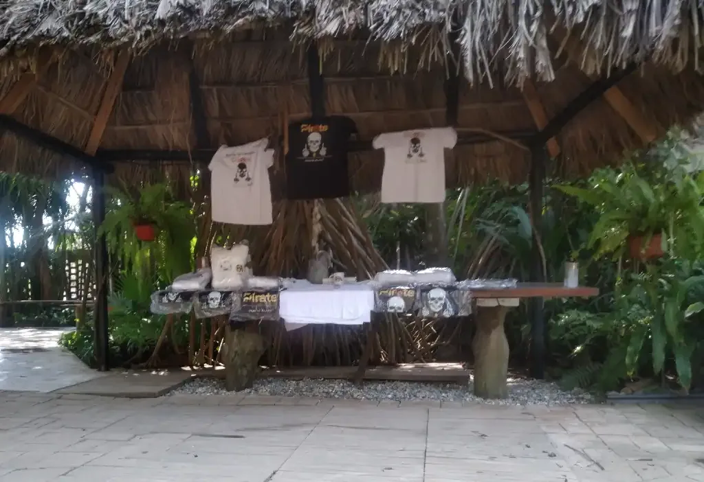 Pirate Chain community booth displaying merchandise